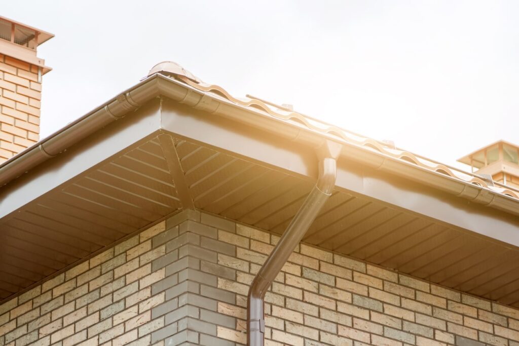 house with fascia and soffits against setting sun